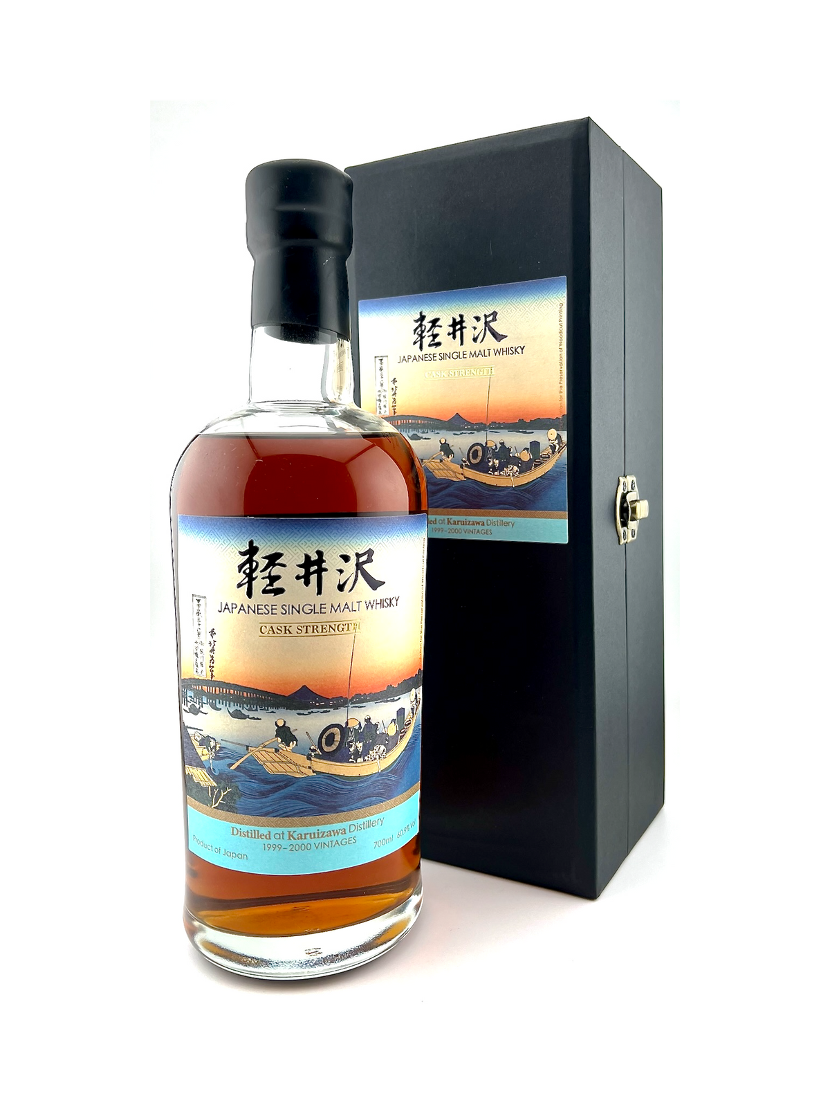 A bottle of Karuizawa single malt whisky, with a label featuring a traditional Japanese woodblock print of Mount Fuji and the Ryôgoku Bridge, accompanied by a black  box.